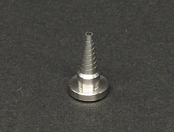 Stainless steel nozzle with spiral ditch
